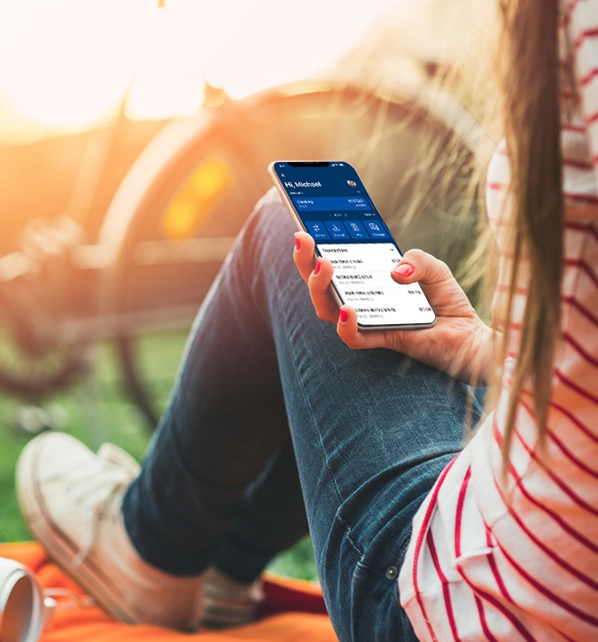 a person holding their mobile device