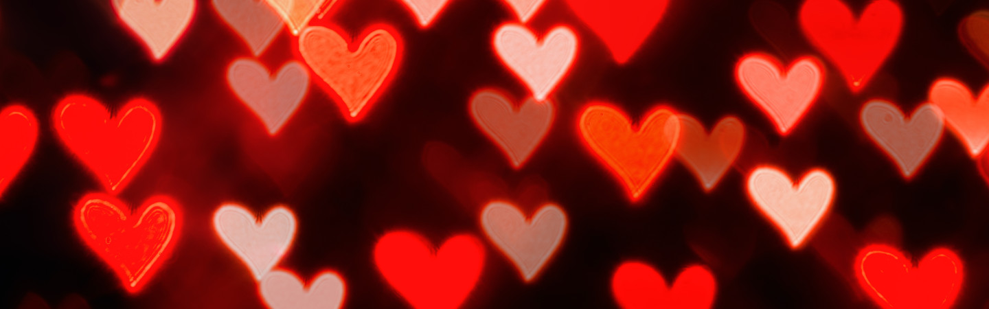 lots of hearts floating on dark background